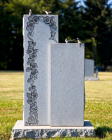Dual Column Light Gray Granite Headstone with Hand-Carved Floral Border